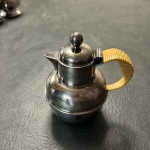 Vintage International silver company silver pot with rattan handle